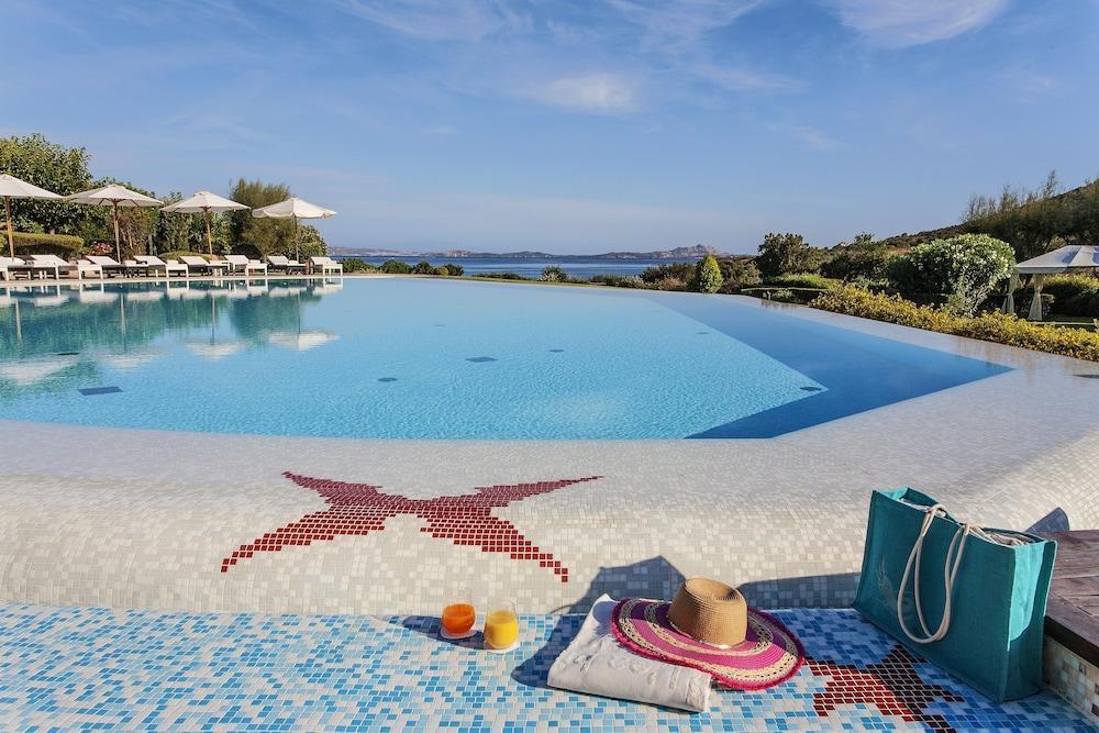 L'Ea Bianca Luxury Resort Baja Sardinia Bagian luar foto