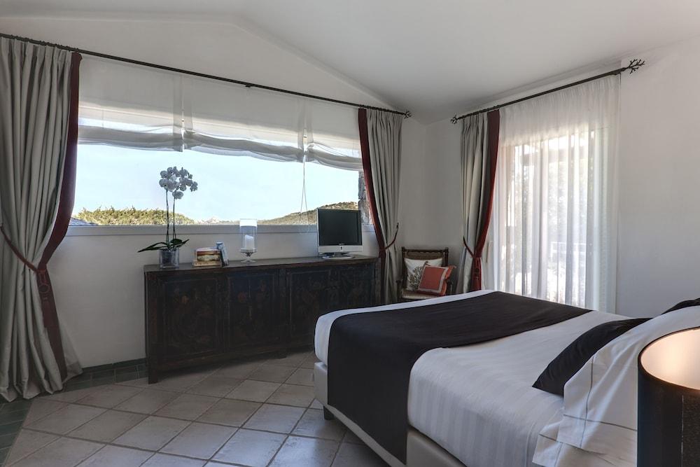 L'Ea Bianca Luxury Resort Baja Sardinia Bagian luar foto