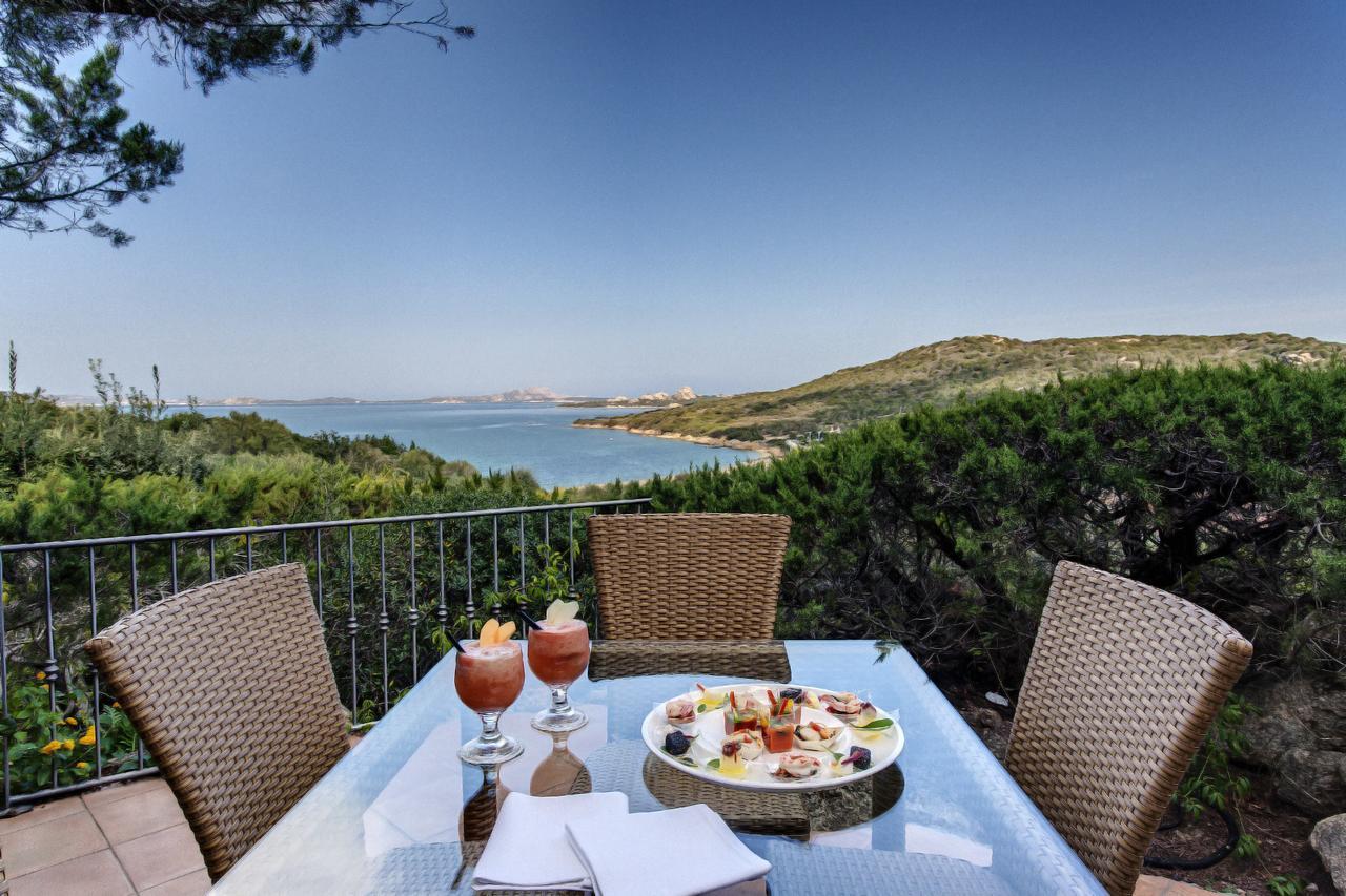 L'Ea Bianca Luxury Resort Baja Sardinia Bagian luar foto