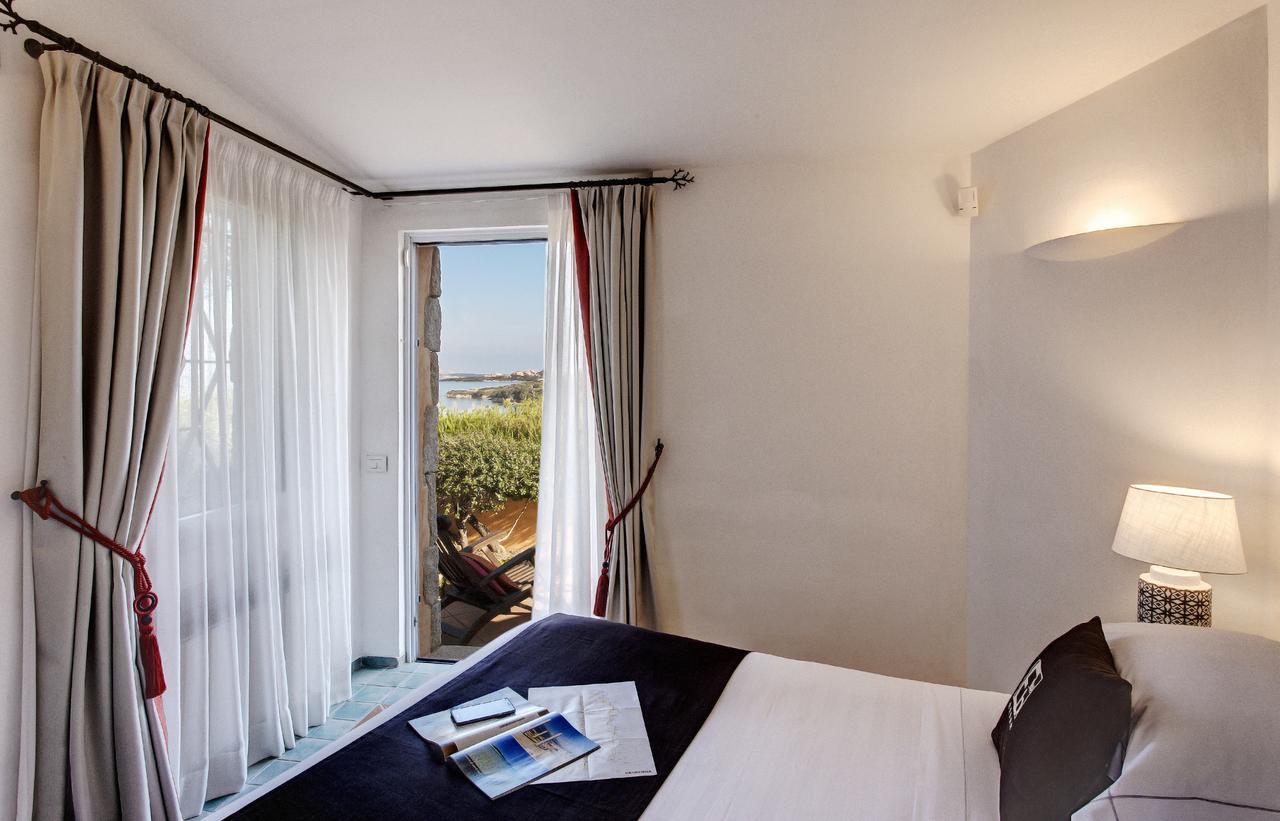 L'Ea Bianca Luxury Resort Baja Sardinia Bagian luar foto