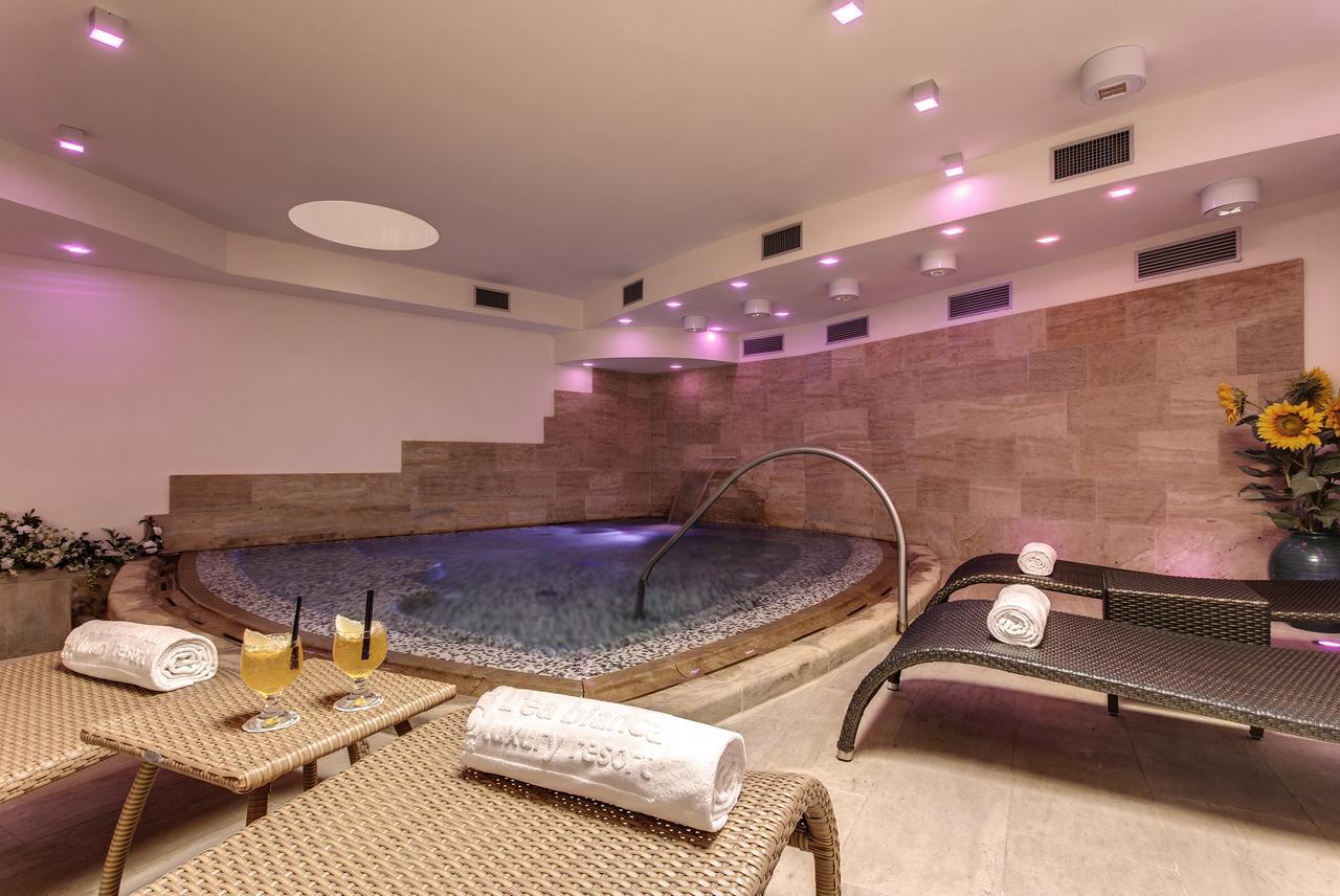 L'Ea Bianca Luxury Resort Baja Sardinia Bagian luar foto